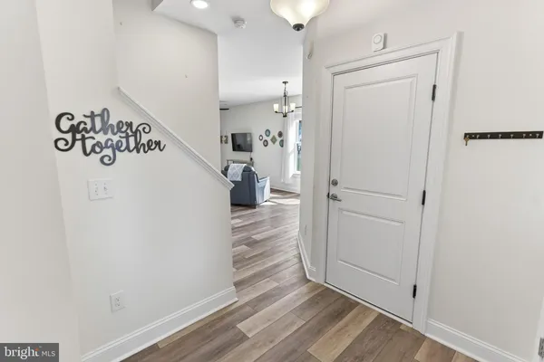 a view of a hallway with closet