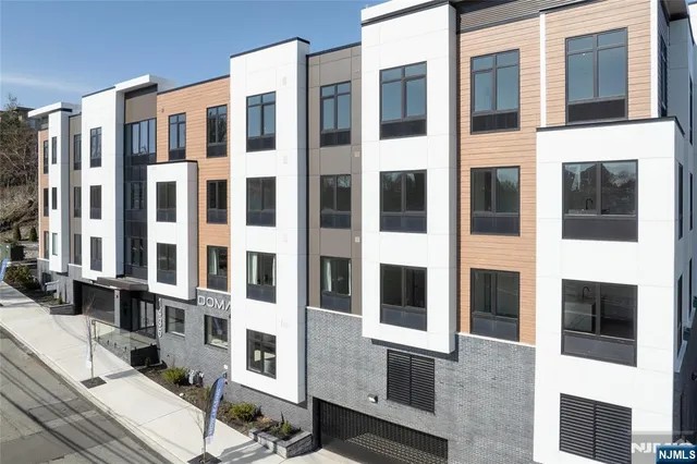 a view of a building with glass windows