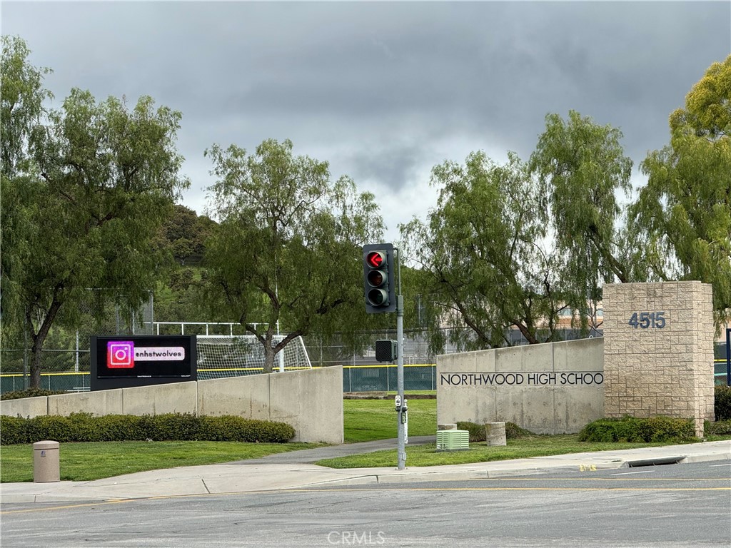 4 Whispering Pine Irvine, CA 92620 - Photo 12 of 12 a view of street with tall buildings