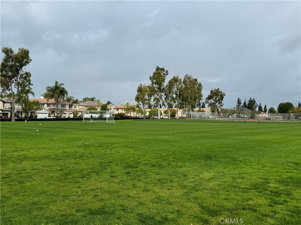 4 Whispering Pine Irvine, CA 92620 - Photo 9 of 12 a backyard of a house with lots of green space