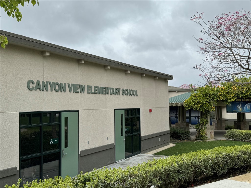 4 Whispering Pine Irvine, CA 92620 - Photo 10 of 12 a front view of a house