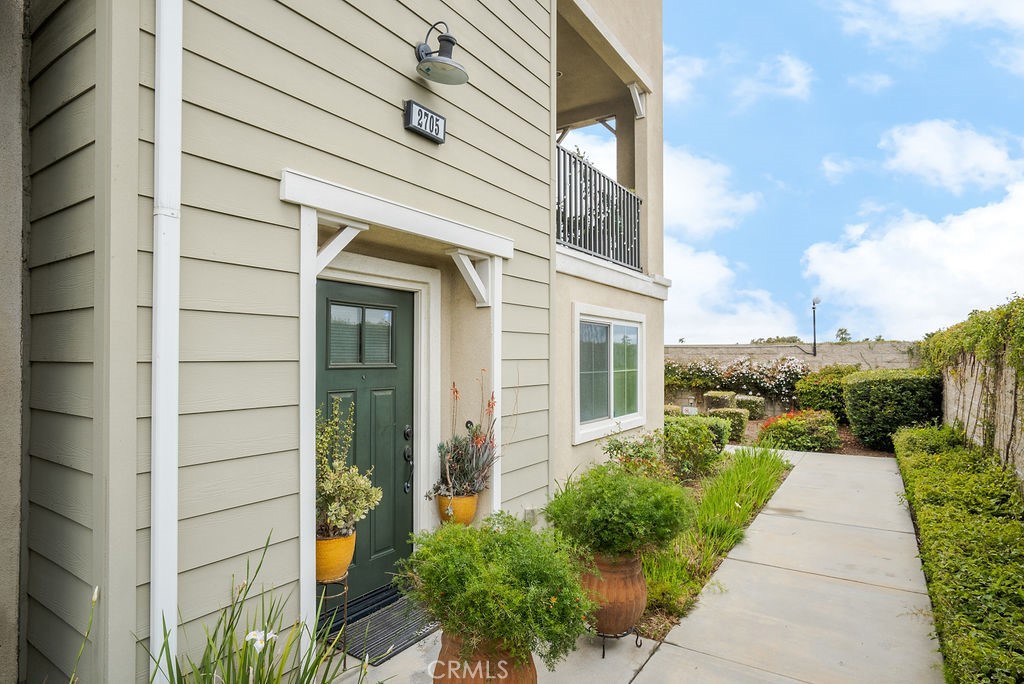 2705 Meyer Lane Pomona, CA 91767 - Photo 2 of 63 a view of a pathway both side of the house