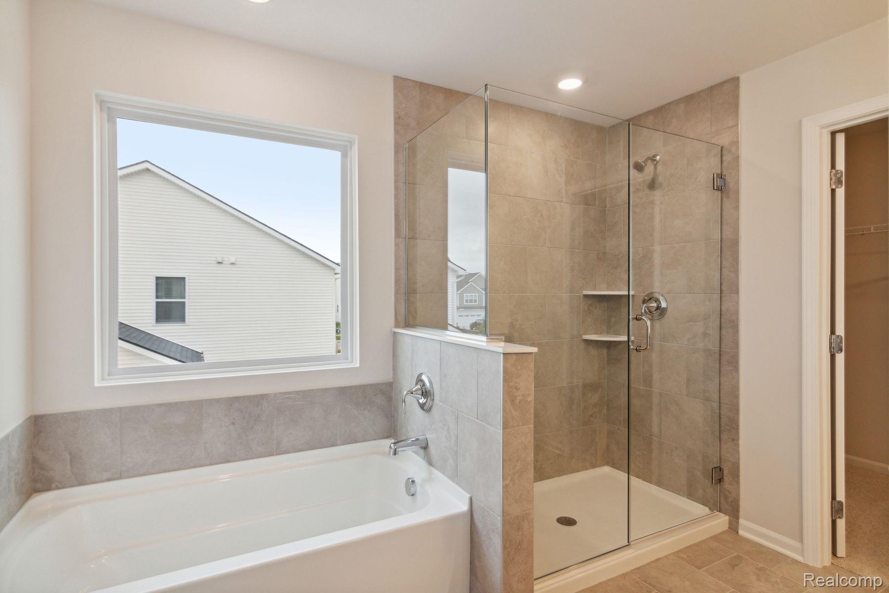 2734 Maize Loop Saline, MI 48176 - Photo 28 of 42 Owner's Bathroom