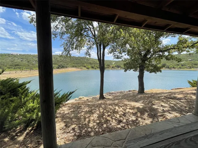 a view of a lake with a house