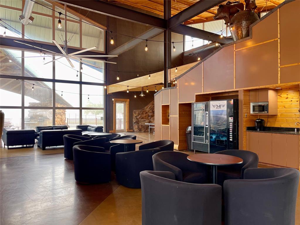 Tbd Tbd Post Oak Gordon, TX 76453 - Photo 3 of 13 a living room with furniture a flat screen tv and windows