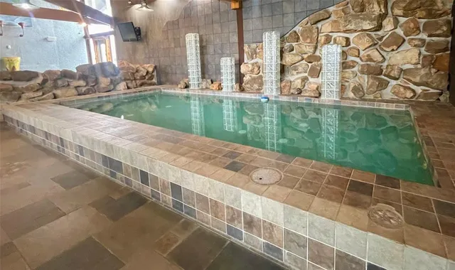 a view of dining room with furniture window and wooden floor