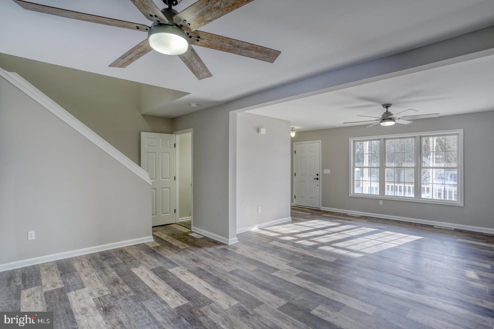 39 High Street Kenton, DE 19955 - Photo 17 of 49 a view of livingroom with window ceiling fan and hardwood floor