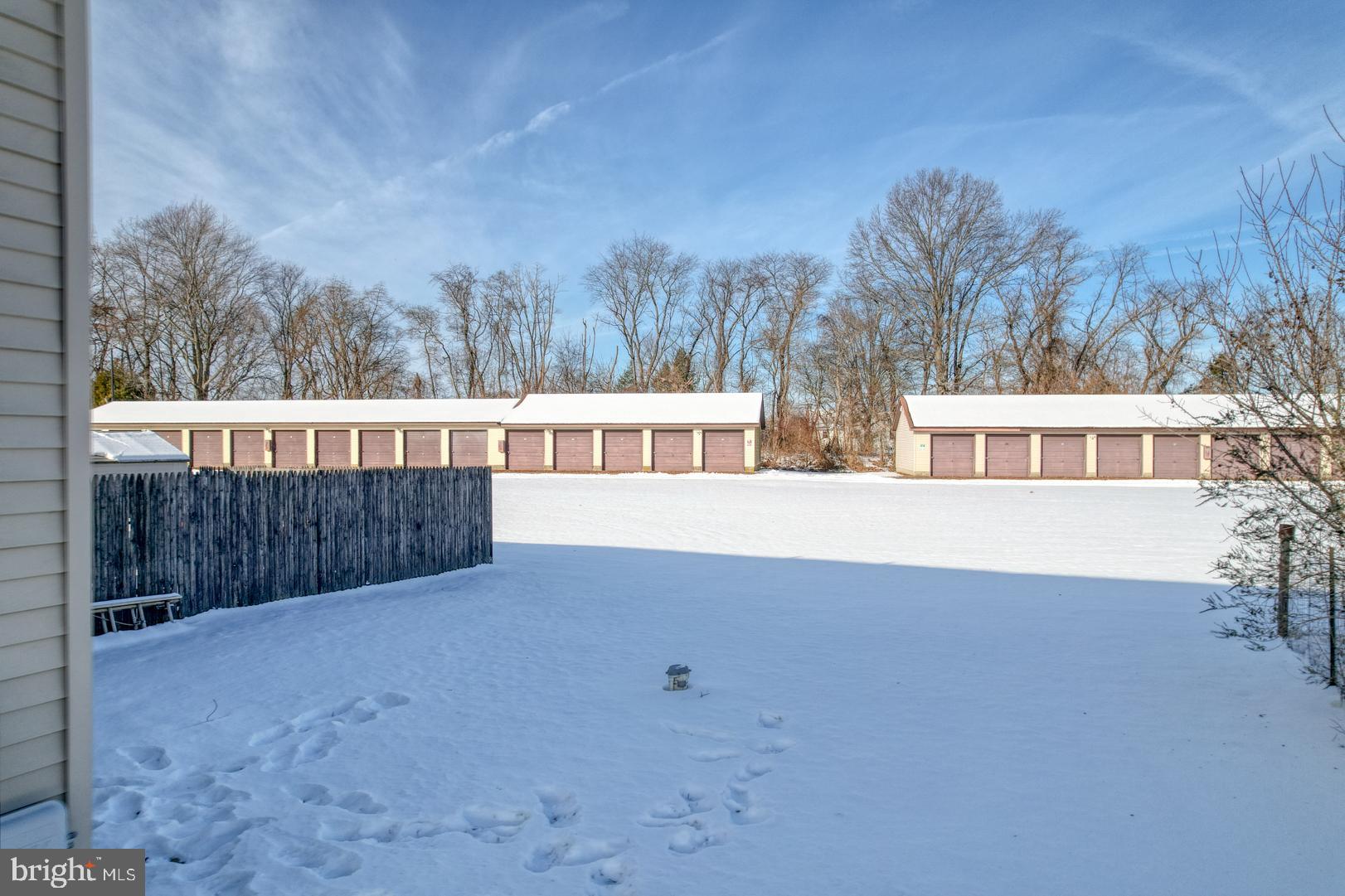 39 High Street Kenton, DE 19955 - Photo 49 of 49 a view of backyard with large trees and wooden fence