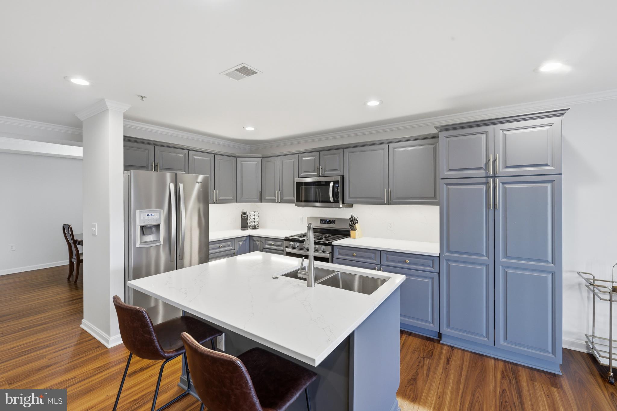 12240 Roundwood Road, Unit 605 Lutherville-Timonium, MD 21093 - Photo 4 of 38 Quarts Island accents the perfect layout