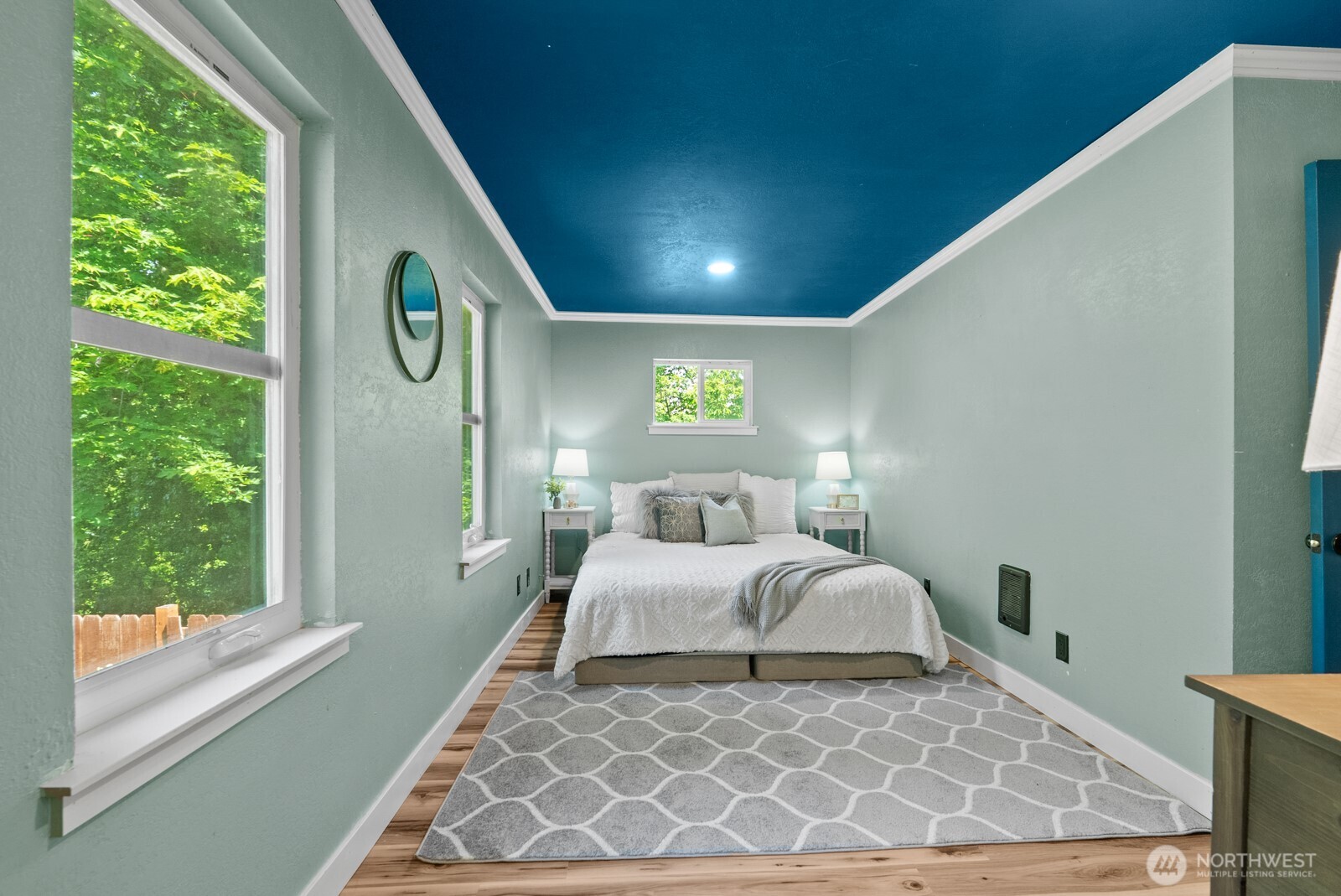 307 4th Street Steilacoom, WA 98388 - Photo 18 of 39 a bedroom with a bed and a window