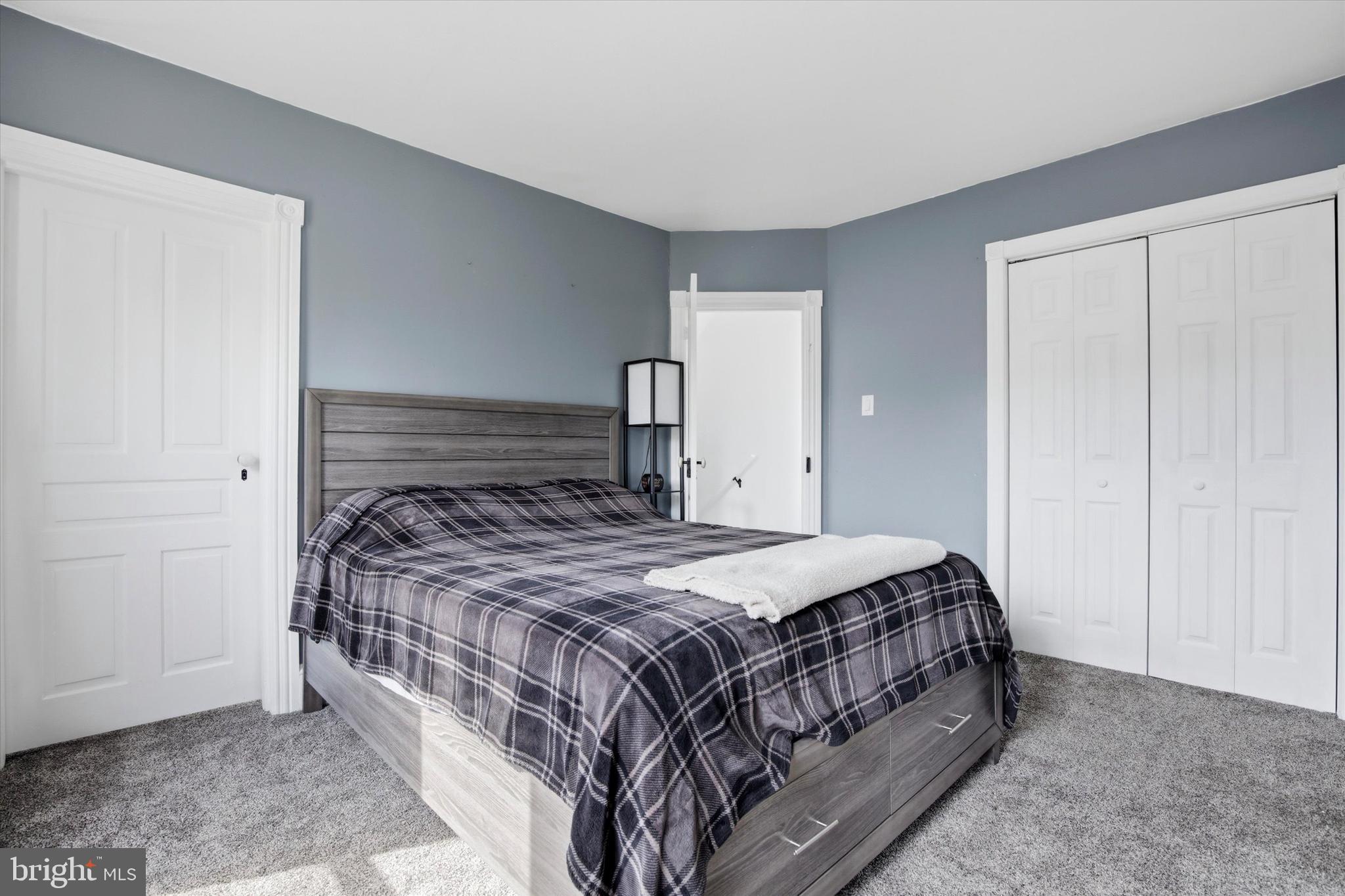 429 Main Street Green Lane, PA 18054 - Photo 11 of 25 a bedroom with a bed and cabinet