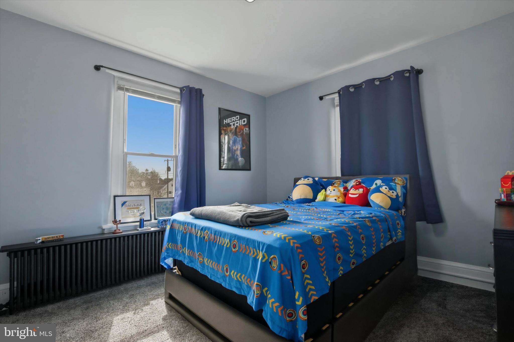 429 Main Street Green Lane, PA 18054 - Photo 12 of 25 a bedroom with a bed and a window