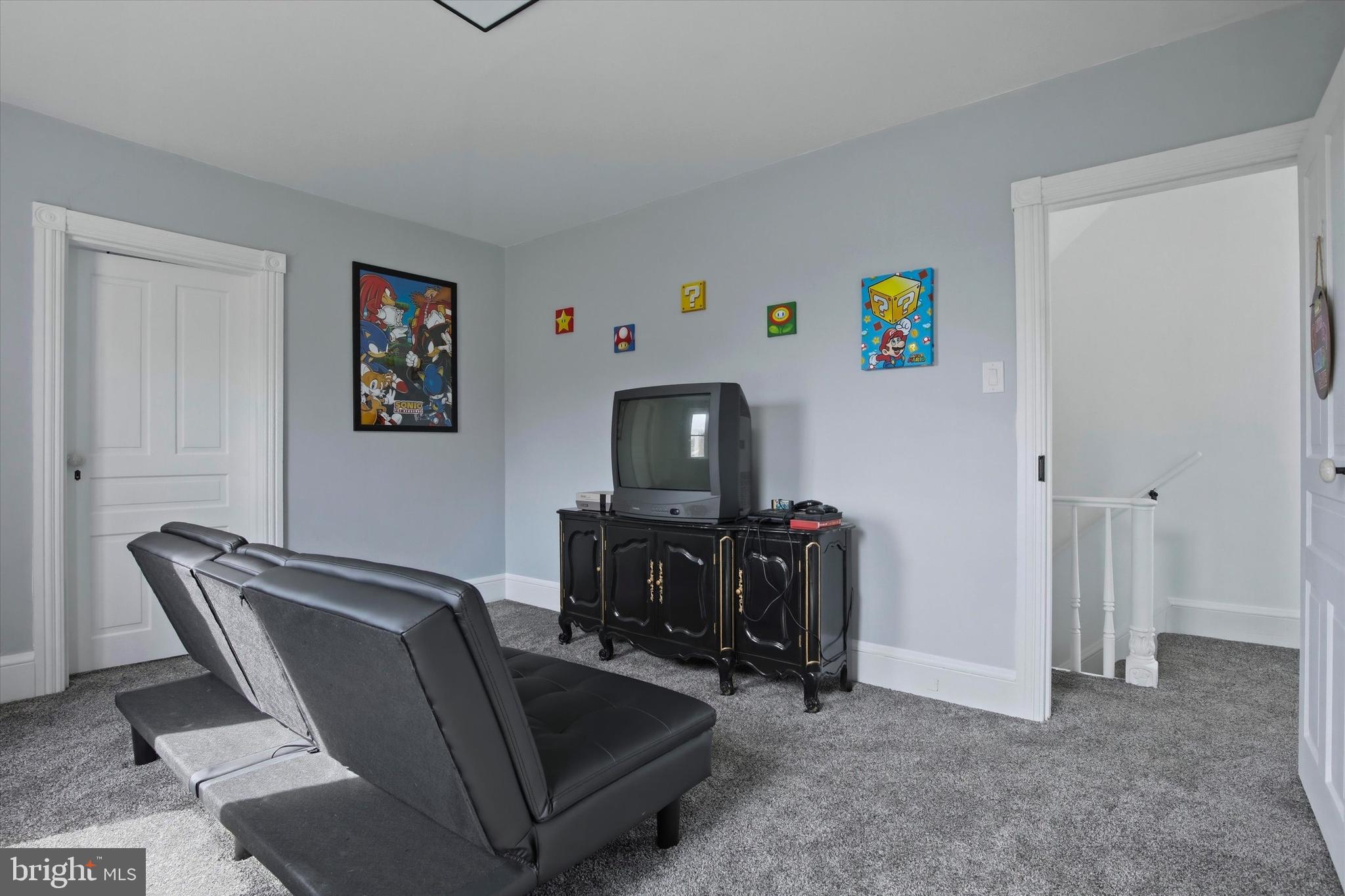 429 Main Street Green Lane, PA 18054 - Photo 13 of 25 a living room with furniture and a flat screen tv