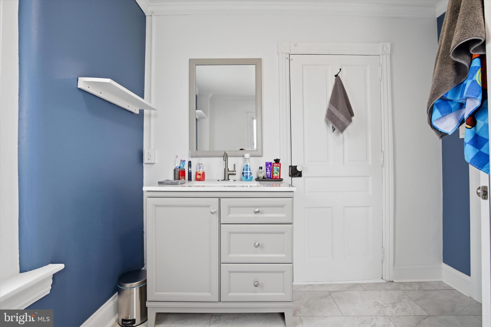 429 Main Street Green Lane, PA 18054 - Photo 15 of 25 a bathroom with a sink and a mirror
