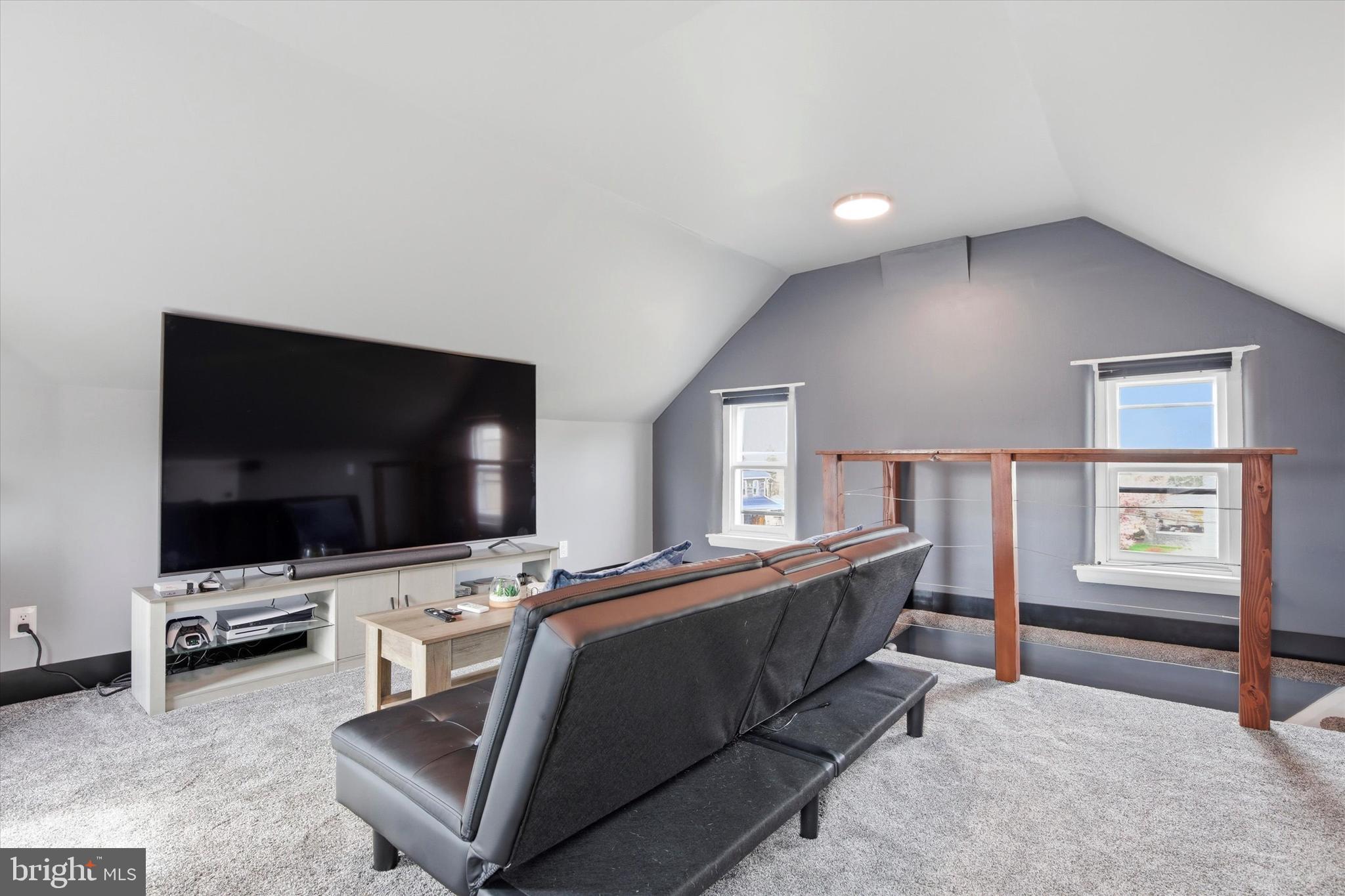 429 Main Street Green Lane, PA 18054 - Photo 17 of 25 a living room with furniture and a flat screen tv