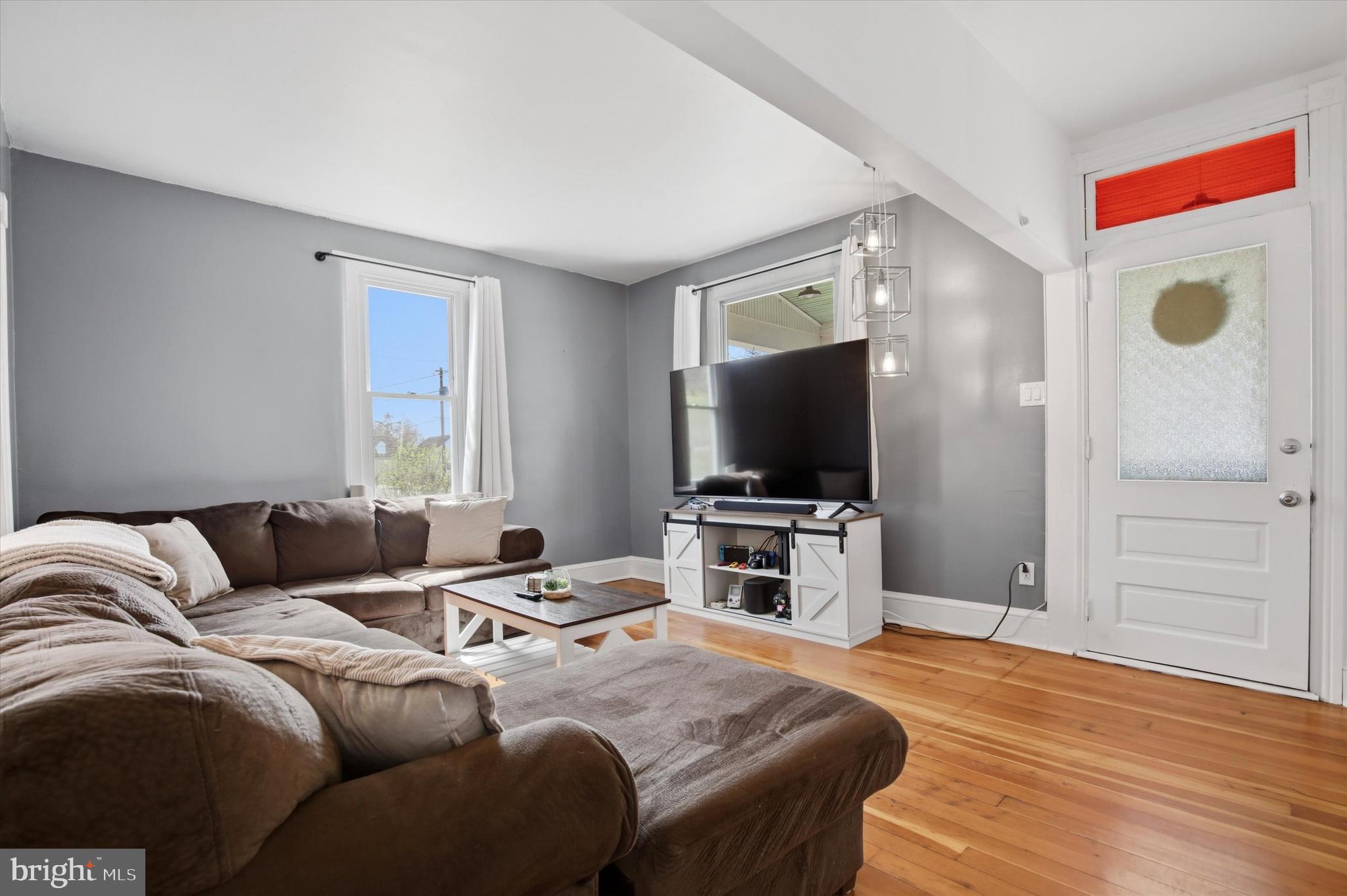 429 Main Street Green Lane, PA 18054 - Photo 2 of 25 a living room with furniture and a flat screen tv