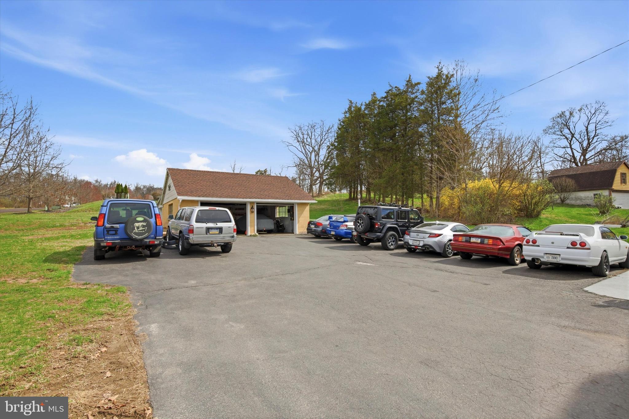 429 Main Street Green Lane, PA 18054 - Photo 21 of 25 a view of a cars parked in front of a house