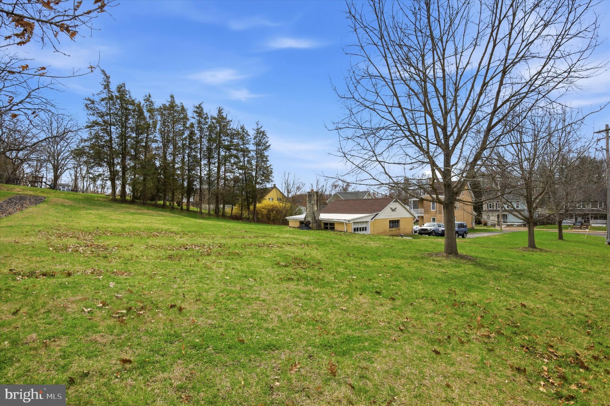 429 Main Street Green Lane, PA 18054 - Photo 24 of 25 a view of a trees and barn in the middle of a yard