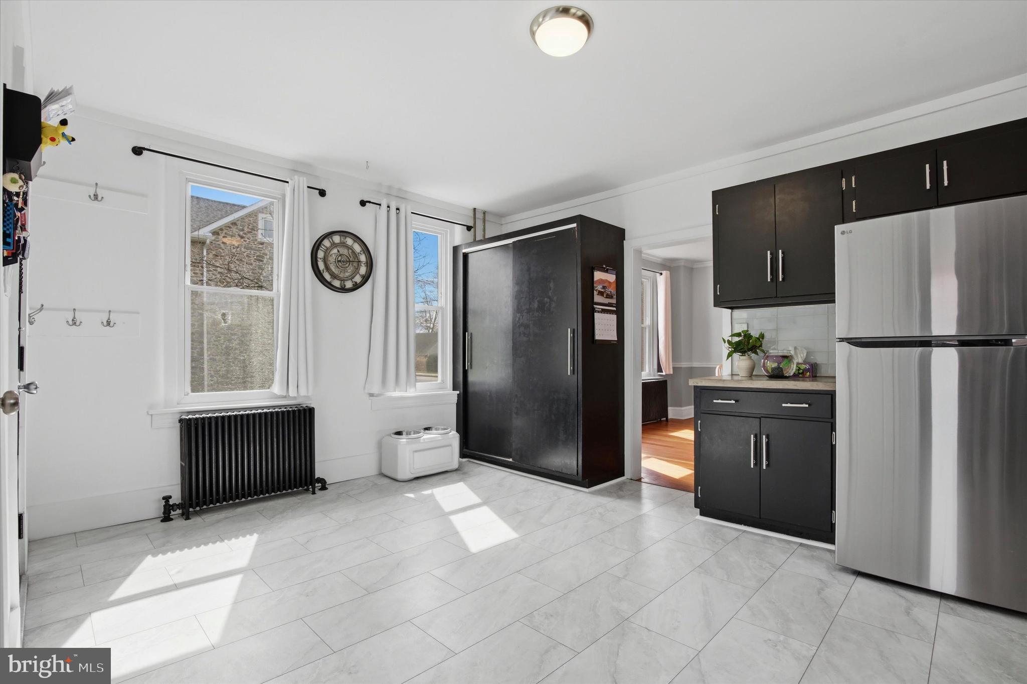 429 Main Street Green Lane, PA 18054 - Photo 6 of 25 a kitchen with a refrigerator and a stove