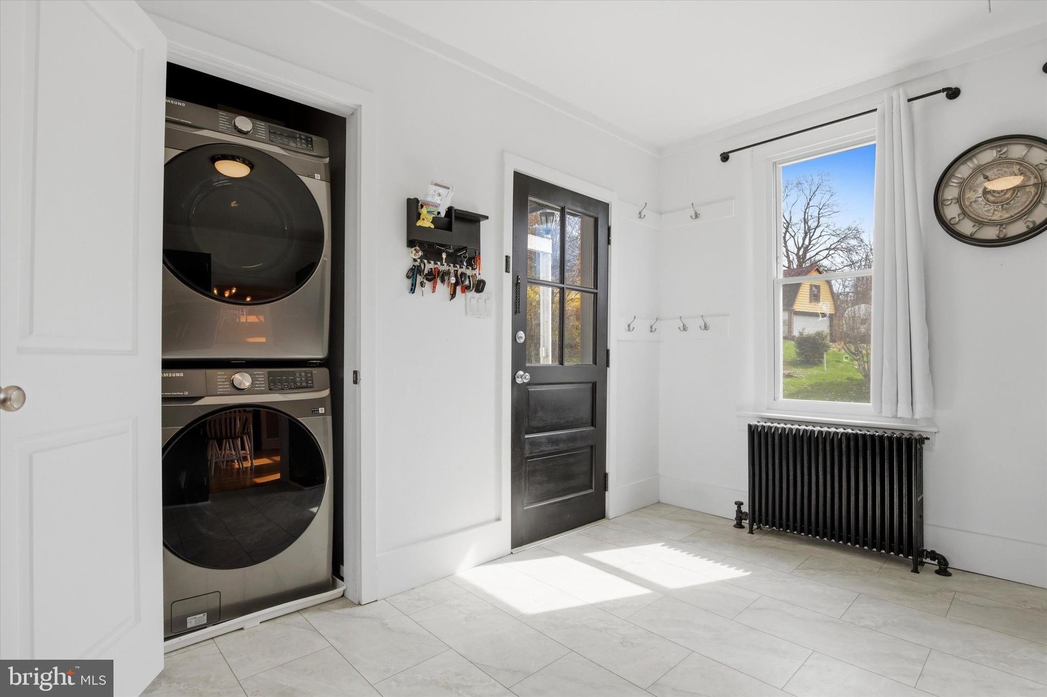 429 Main Street Green Lane, PA 18054 - Photo 8 of 25 a view of a hallway with washer and dryer