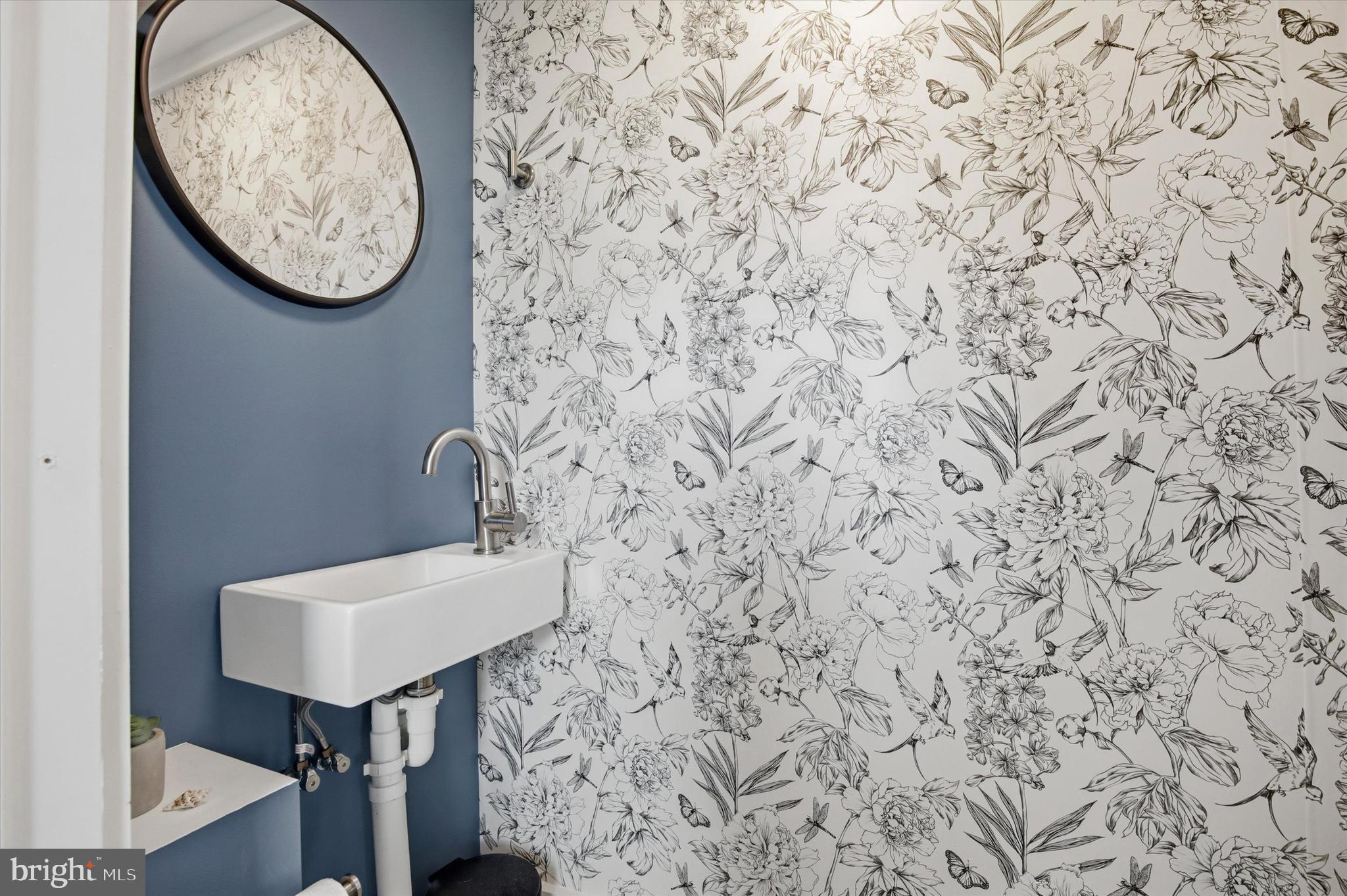429 Main Street Green Lane, PA 18054 - Photo 9 of 25 a bathroom with a toilet and a sink