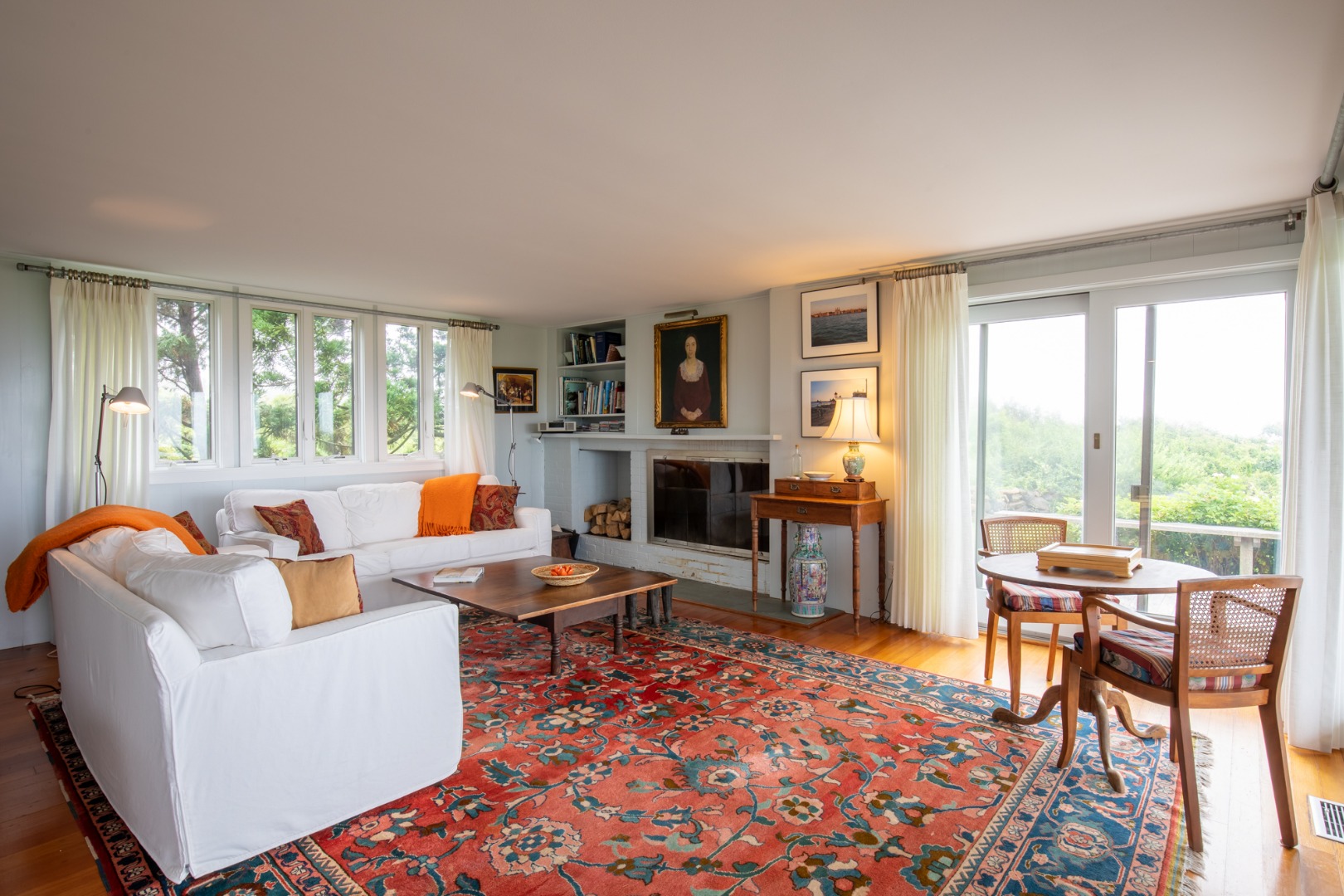 95 Stonewall Road Chilmark, MA 02535 - Photo 15 of 51 a living room with fireplace furniture and a large window