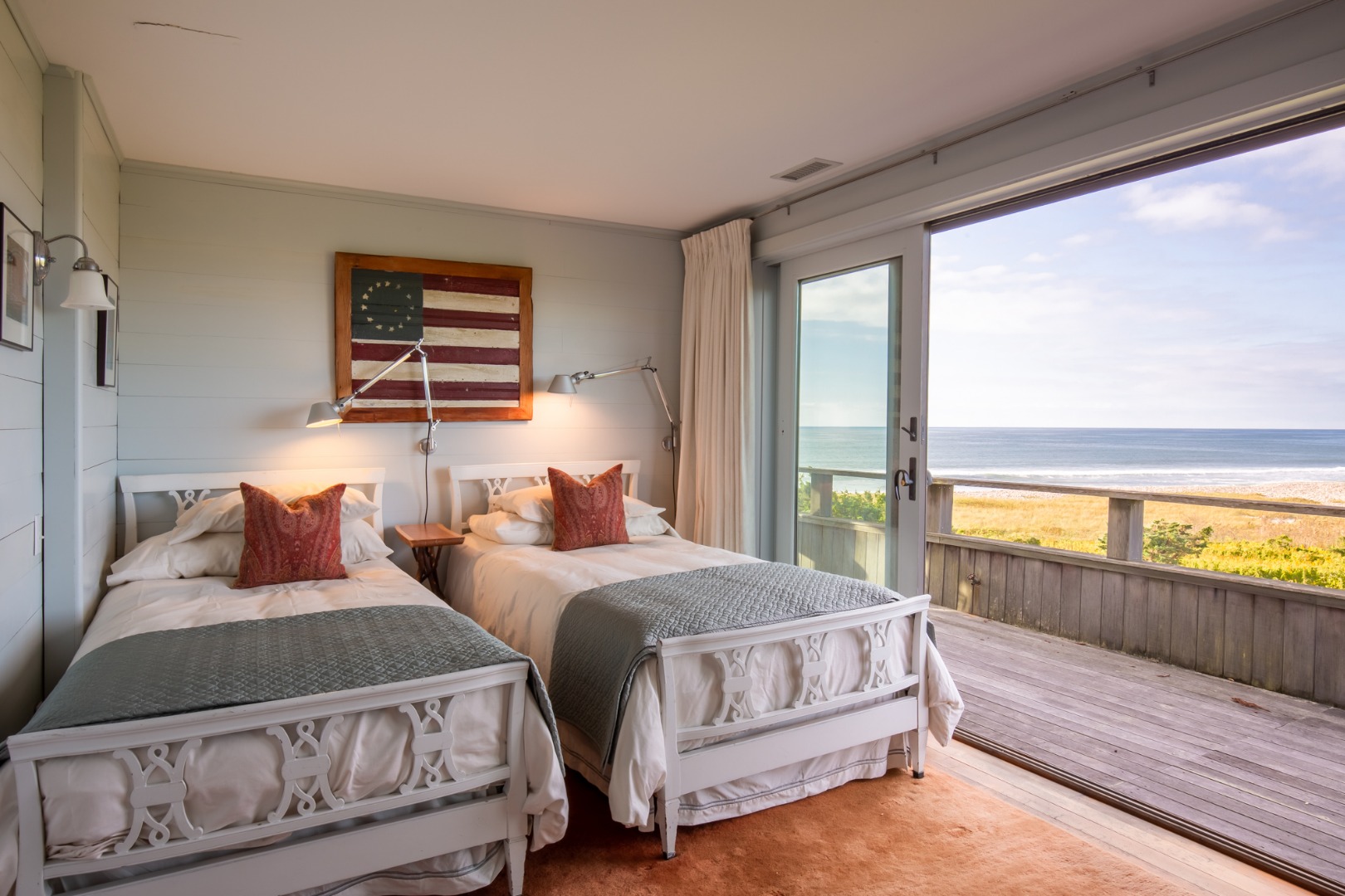 95 Stonewall Road Chilmark, MA 02535 - Photo 18 of 51 a bedroom with double bed and a floor to ceiling window