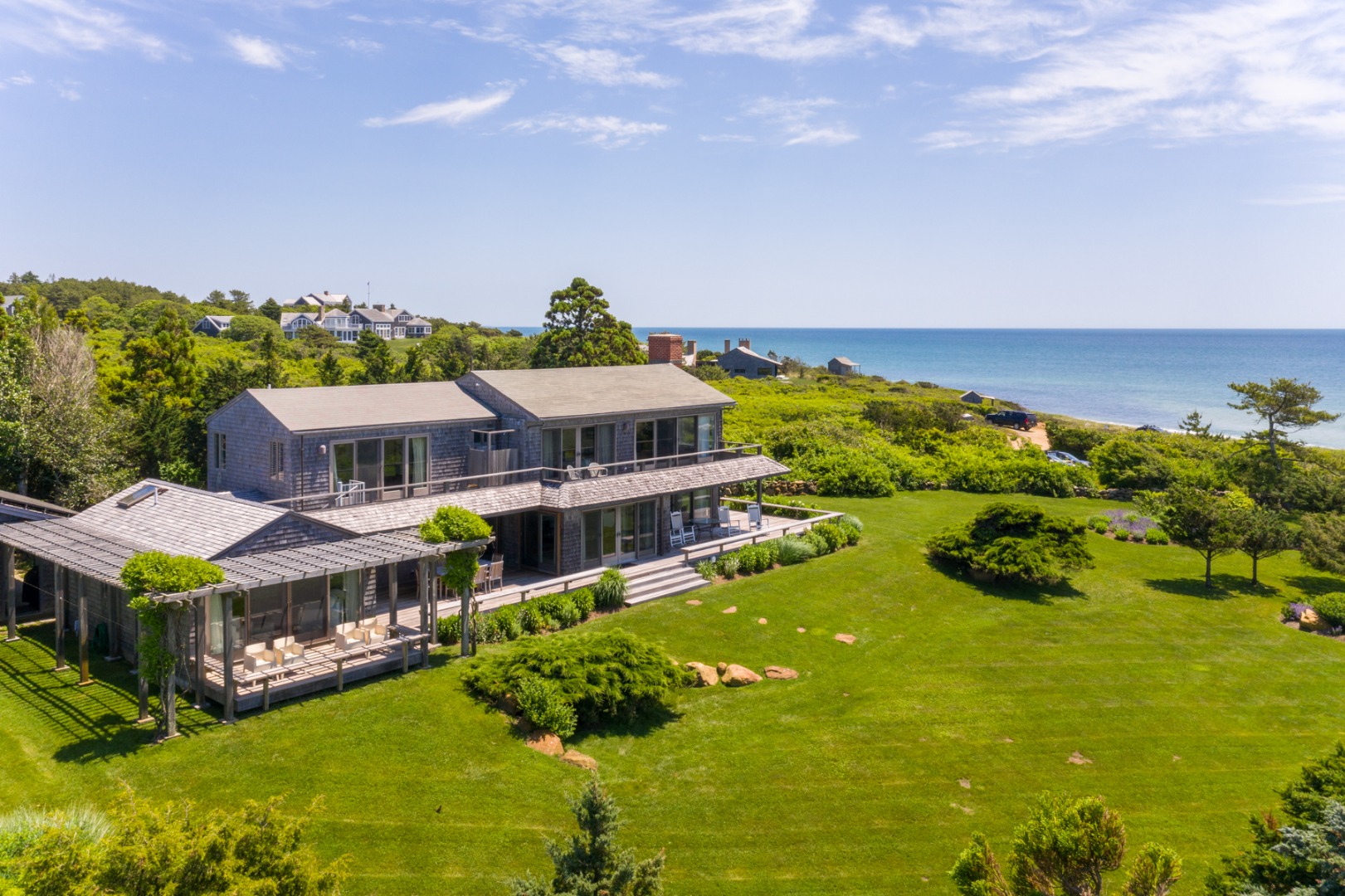 95 Stonewall Road Chilmark, MA 02535 - Photo 21 of 51 a aerial view of a house with a big yard
