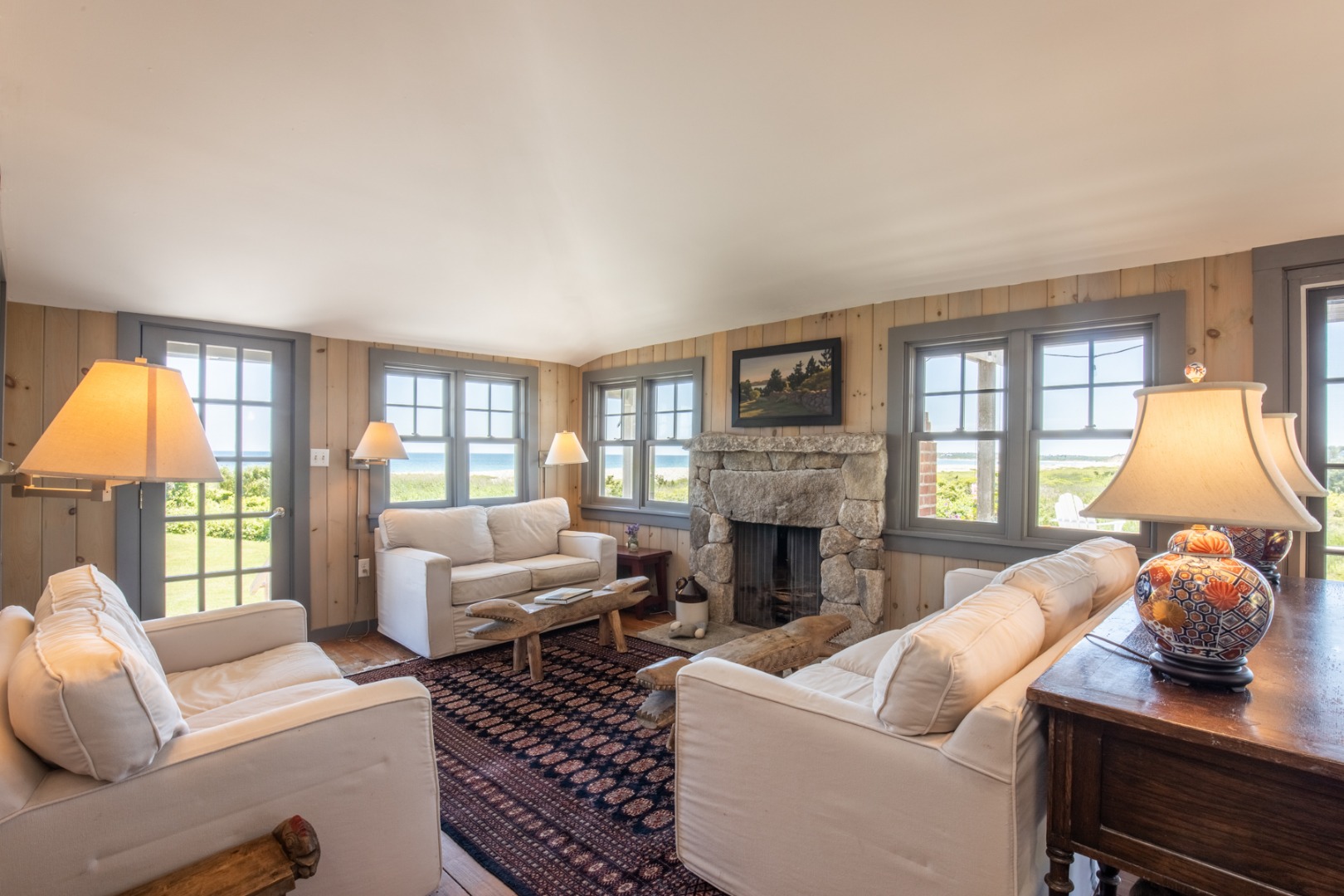 95 Stonewall Road Chilmark, MA 02535 - Photo 29 of 51 a living room with furniture and a fireplace
