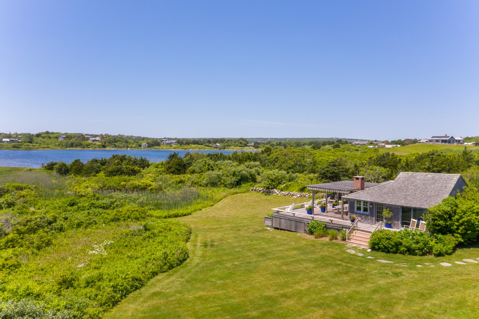 95 Stonewall Road Chilmark, MA 02535 - Photo 38 of 51 a view of an ocean with city view