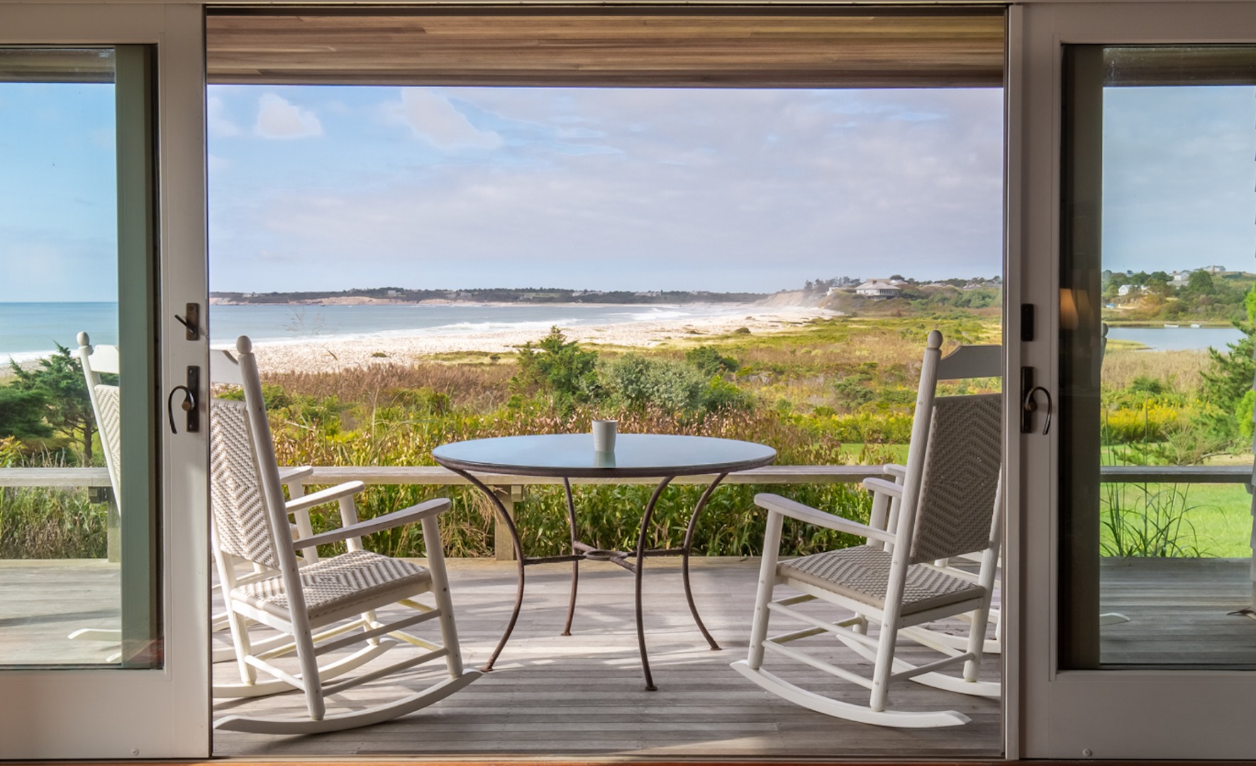 95 Stonewall Road Chilmark, MA 02535 - Photo 5 of 51 a view of a chairs and table in balcony