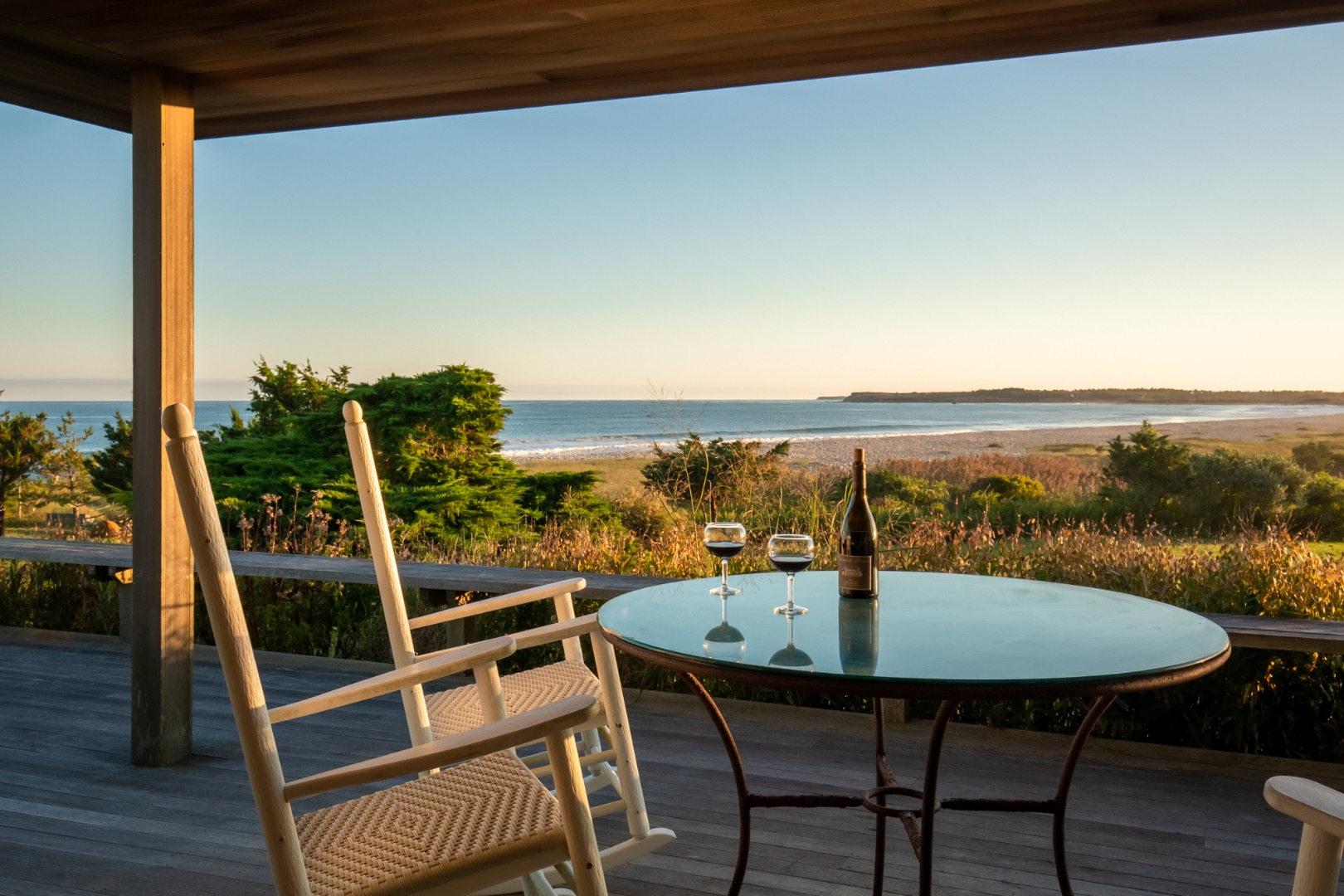 95 Stonewall Road Chilmark, MA 02535 - Photo 49 of 51 a view of a balcony with table and chairs