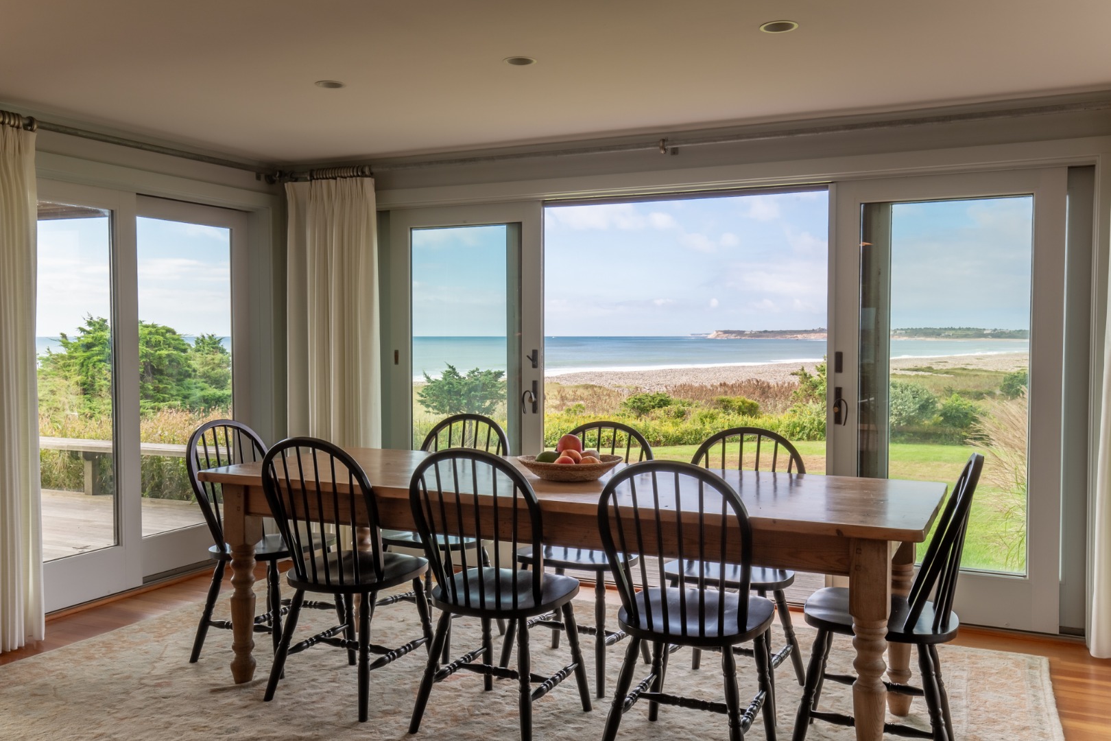 95 Stonewall Road Chilmark, MA 02535 - Photo 7 of 51 a view of a dining room with furniture window and outside view