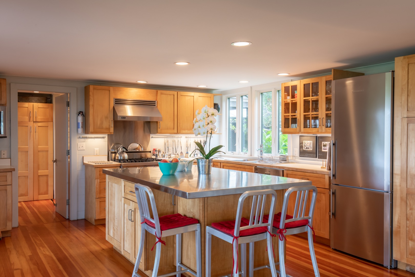 95 Stonewall Road Chilmark, MA 02535 - Photo 10 of 51 a kitchen with stainless steel appliances granite countertop a stove and a refrigerator