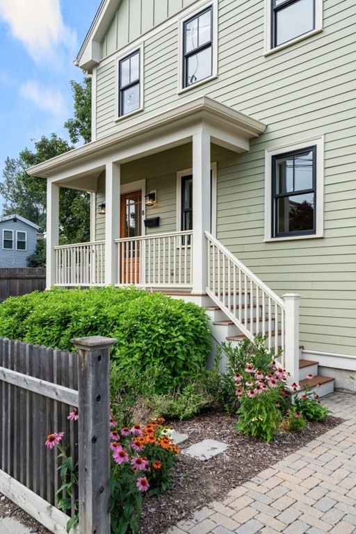 8 Clyde Street Somerville, MA 02145 - Photo 2 of 22 a front view of a house with a garden