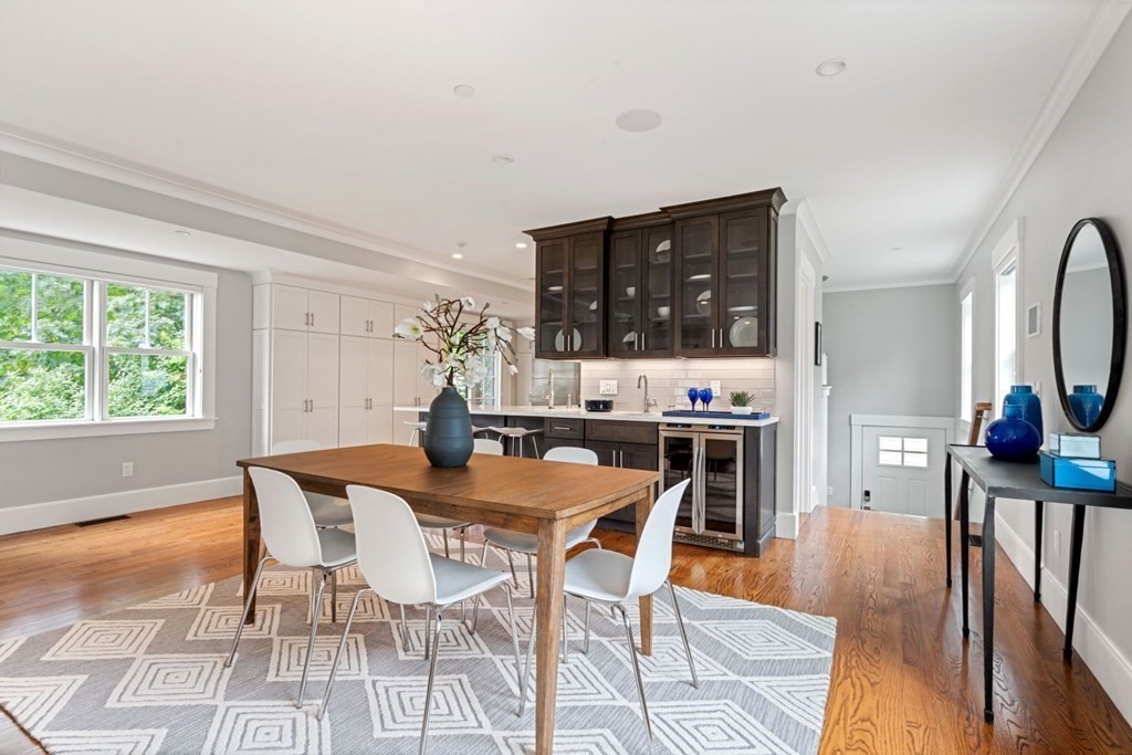 8 Clyde Street Somerville, MA 02145 - Photo 5 of 22 a view of a dining room with furniture and wooden floor