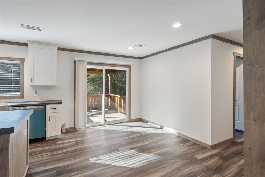 9603 County Road 2138 Kemp, TX 75143 - Photo 12 of 36 a view of a kitchen with a sink and a window