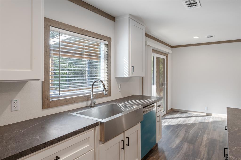 9603 County Road 2138 Kemp, TX 75143 - Photo 10 of 36 a kitchen with a sink and a window