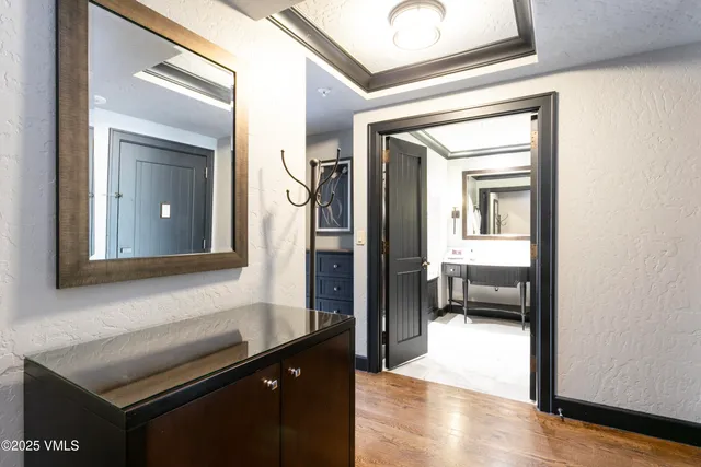a en suite bathroom with a sink a mirror and a shower