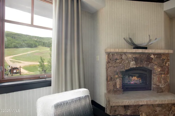 a living room with a fireplace