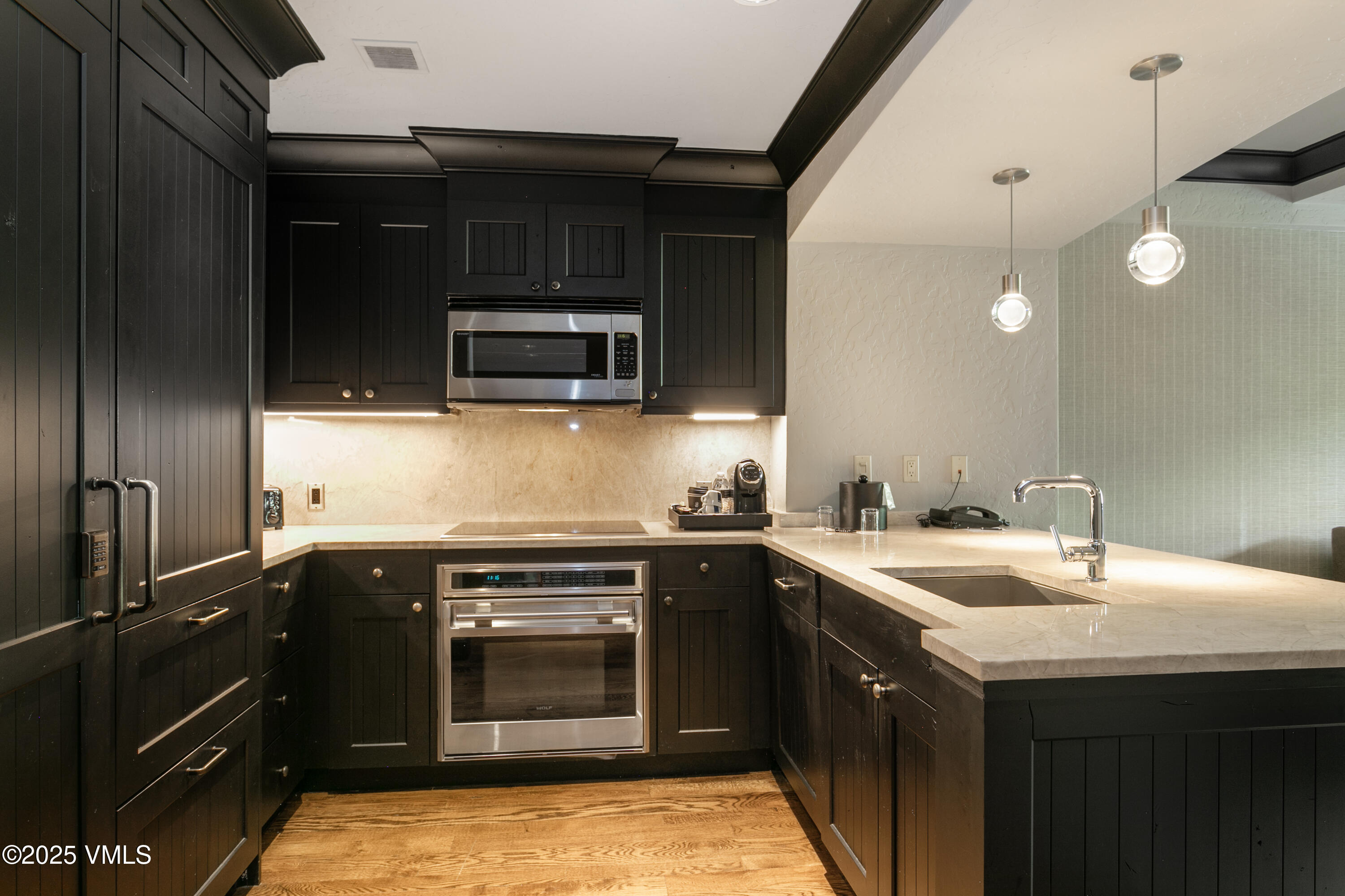 130 Daybreak Ridge Road, Unit 732 Avon, CO 81620 - Photo 10 of 17 a kitchen with a sink and steel appliances