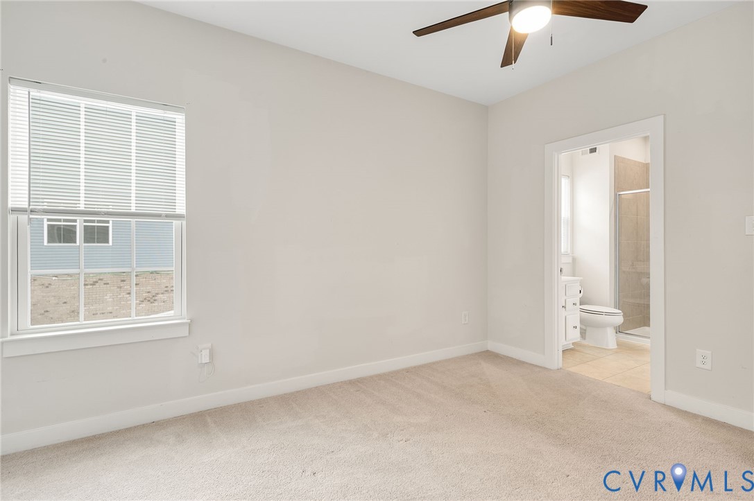 8601 Forge Gate Lane Chesterfield, VA 23832 - Photo 15 of 37 an empty room with a empty space and a ceiling fan