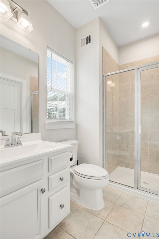 8601 Forge Gate Lane Chesterfield, VA 23832 - Photo 16 of 37 a bathroom with a sink toilet and shower