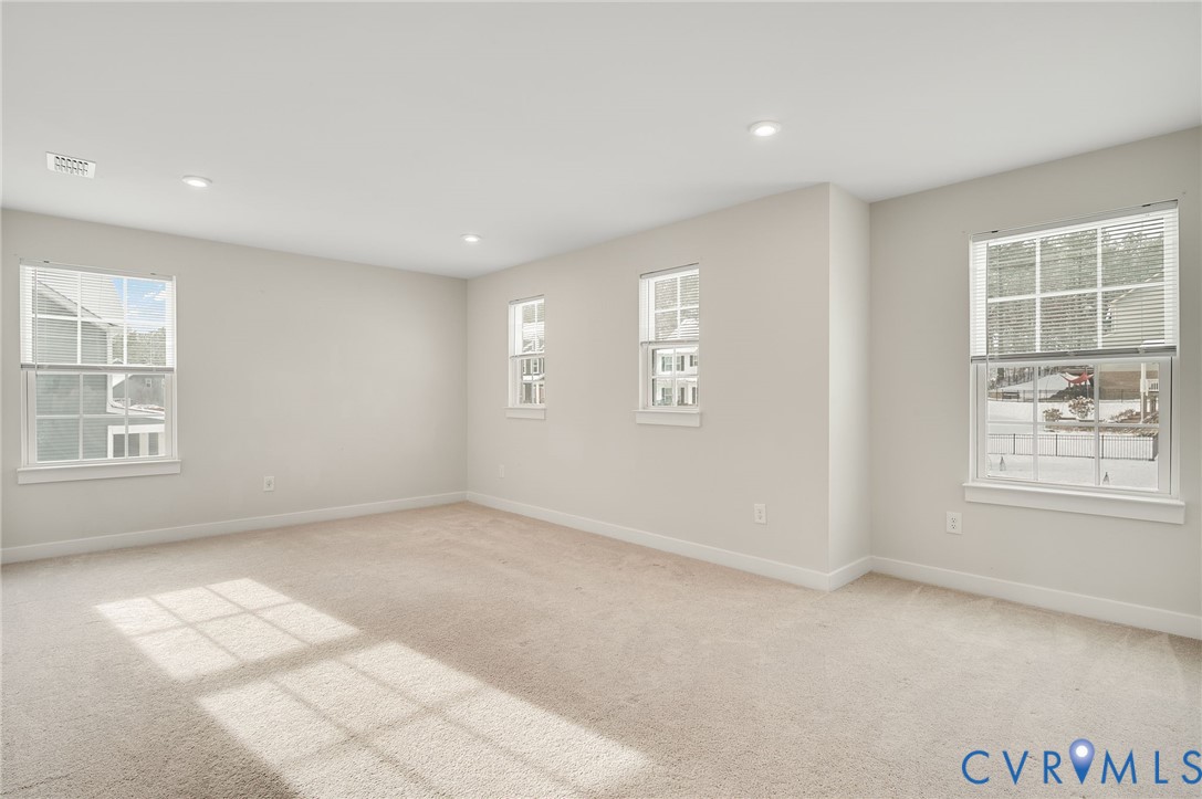 8601 Forge Gate Lane Chesterfield, VA 23832 - Photo 19 of 37 an empty room with windows