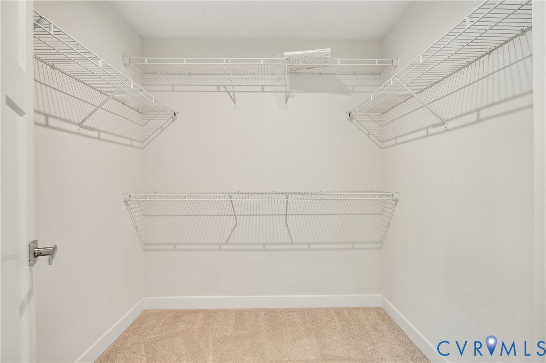 8601 Forge Gate Lane Chesterfield, VA 23832 - Photo 42 of 42 a view of a room with racks on the wall