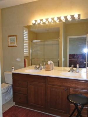 13384 Delaney Road Huntley, IL 60142 - Photo 14 of 16 a bathroom with a granite countertop sink and a mirror
