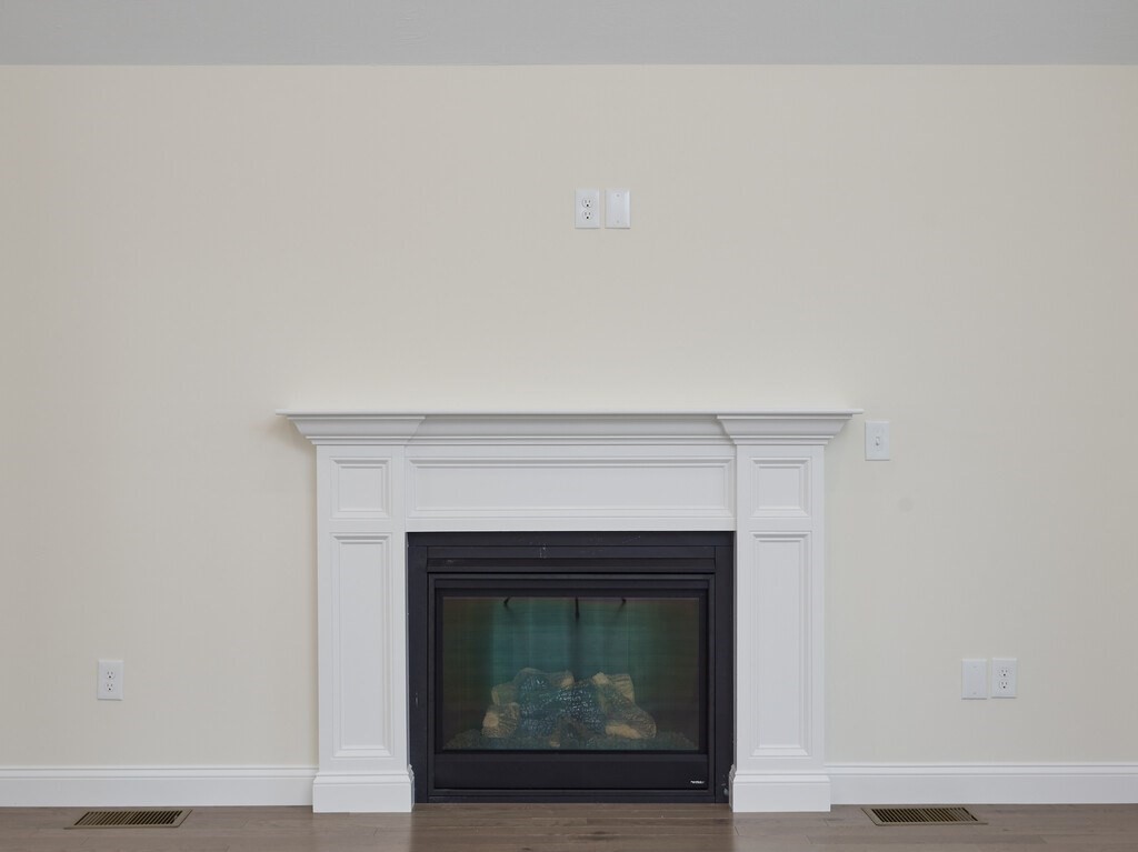 795 Leominster Road Lunenburg, MA 01462 - Photo 13 of 33 a living room with a fireplace