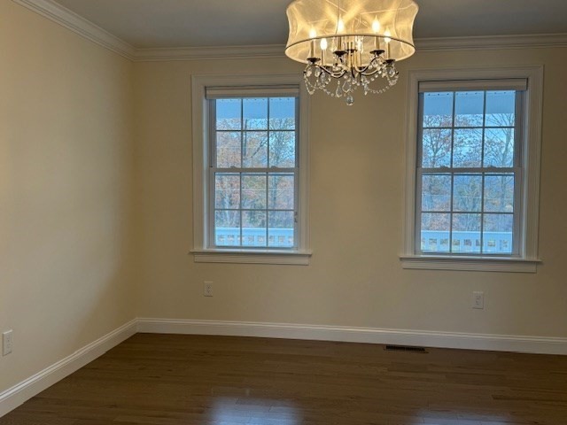 795 Leominster Road Lunenburg, MA 01462 - Photo 19 of 33 an empty room with wooden floor and windows