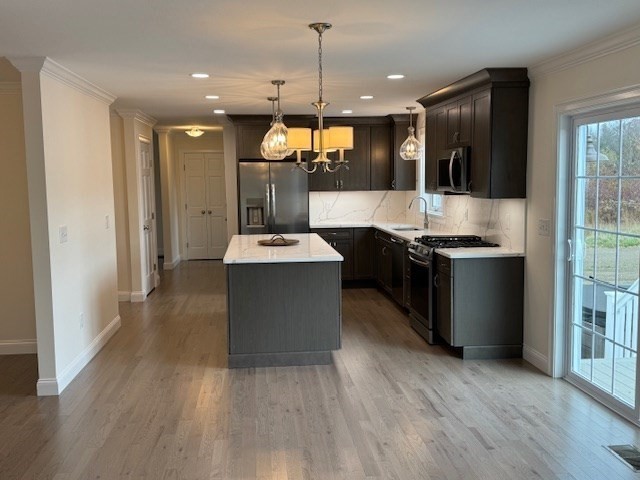 795 Leominster Road Lunenburg, MA 01462 - Photo 20 of 33 a kitchen with stainless steel appliances granite countertop a stove a sink and a refrigerator