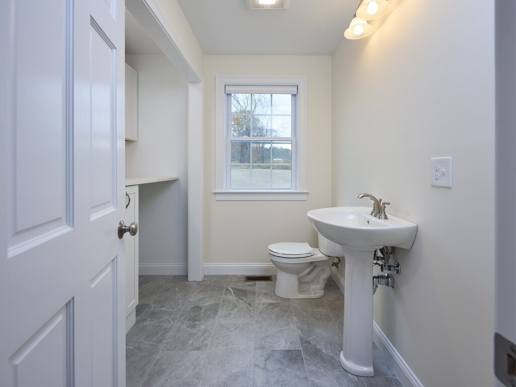 795 Leominster Road Lunenburg, MA 01462 - Photo 30 of 33 a bathroom with a sink toilet and shower